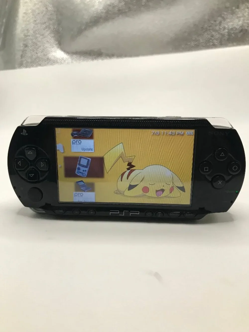 Black PSP 1000 Console W/Charger, preloaded with over 5,000 Game,